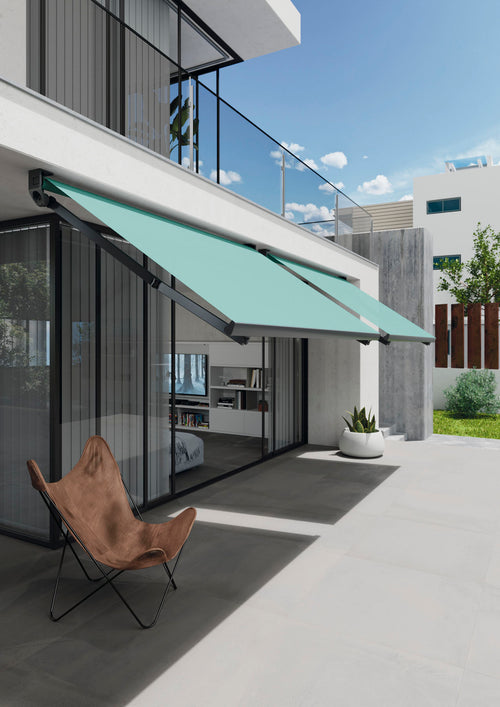 Vela awning shading a contemporary terrace